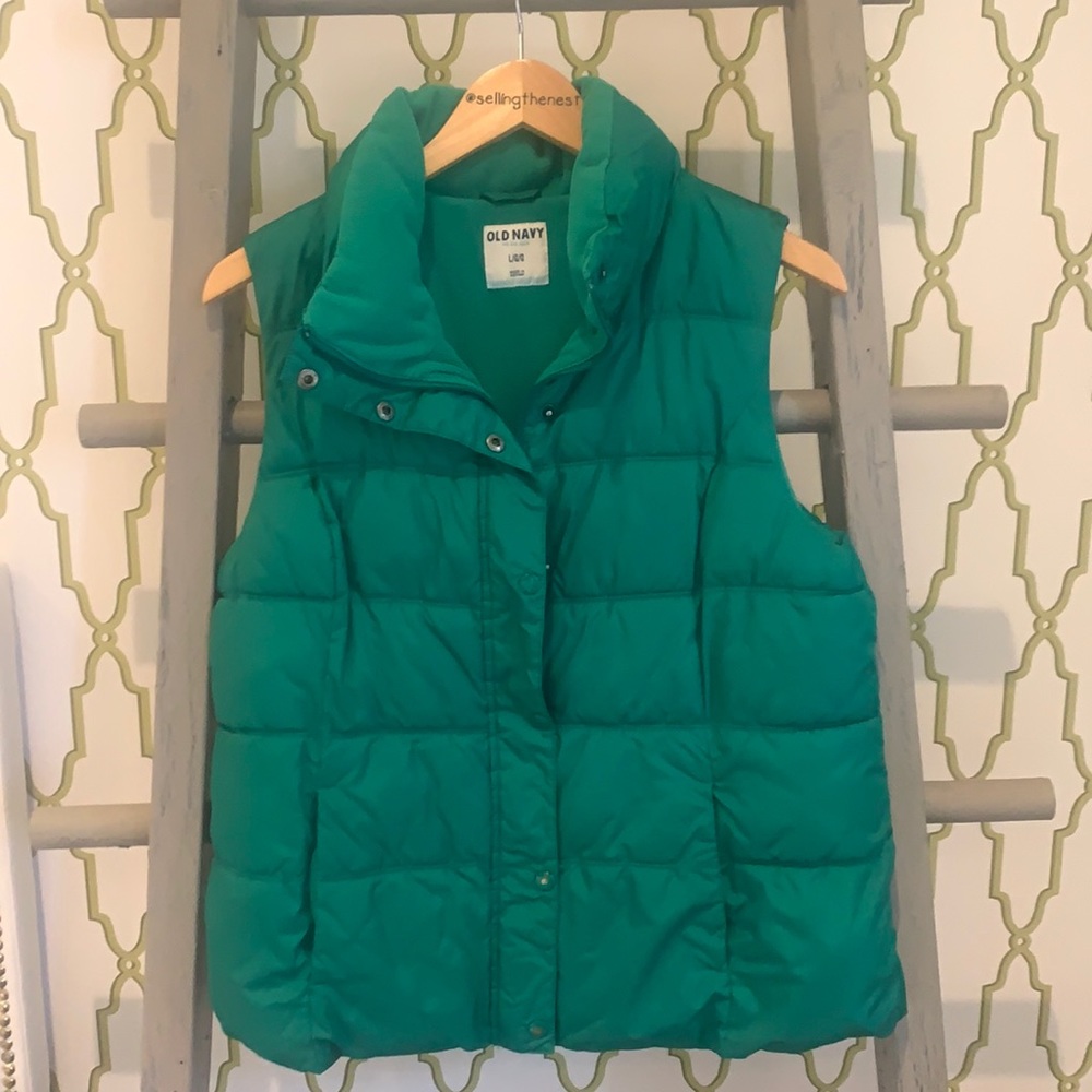 Woman’s green puffer jacket from Old Navy